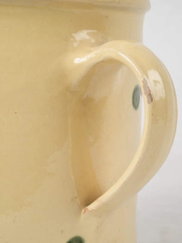 Antique French pitcher - yellow w/ spots 9½"