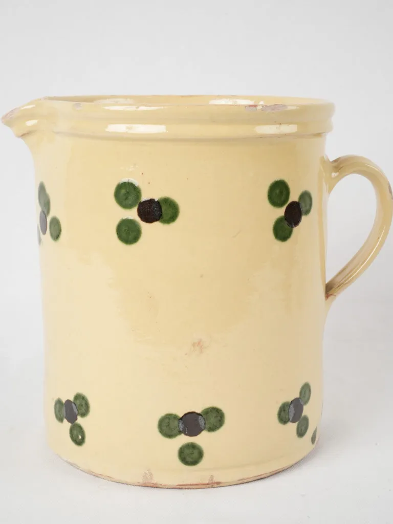 Antique French pitcher - yellow w/ spots 9½"